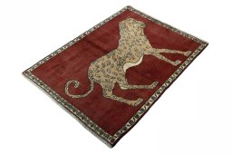 Corner detail of 2000s Persian Gabbeh rug showing border pattern and Wool pile