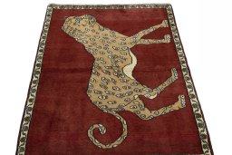 Surface texture of 2000s Persian Gabbeh rug with natural Wool and intricate pattern