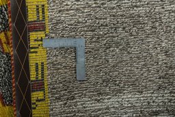 Close-up detail of 2000s Persian Gabbeh rug from Iran / Persia showing Wool weave