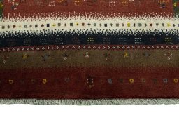 Central medallion detail of 2000s Persian Gabbeh rug from Iran / Persia