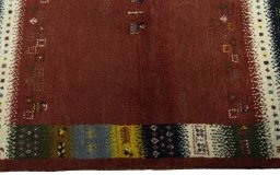 Close-up detail of 2000s Persian Gabbeh rug from Iran / Persia showing Wool weave