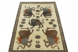Surface texture of 2000s Persian Gabbeh rug with natural Wool and intricate pattern