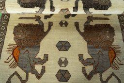 Full view of 2000s Persian Gabbeh rug from Iran / Persia, 192 × 122 cm in Beige tones