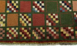 Central medallion detail of 2000s Persian Gabbeh rug from Iran / Persia