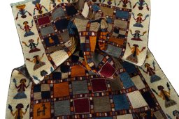 Corner detail of 2000s Persian Gabbeh rug showing border pattern and Wool pile