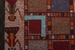 Close-up detail of 2000s Persian Gabbeh rug from Iran / Persia showing Wool weave