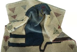 Corner detail of 2000s Persian Gabbeh rug showing border pattern and Wool pile