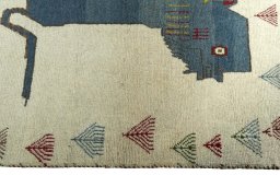 Close-up detail of 2000s Persian Gabbeh rug from Iran / Persia showing Wool weave