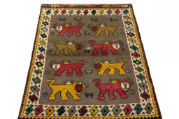 Surface texture of 2000s Persian Gabbeh rug with natural Wool and intricate pattern