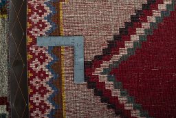Close-up detail of 2000s Persian Gabbeh rug from Iran / Persia showing Wool weave