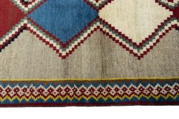 Close-up detail of 2000s Persian Gabbeh rug from Iran / Persia showing Wool weave