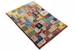 Close-up detail of 2000s Persian Gabbeh rug from Iran / Persia showing Wool weave