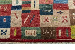 Central medallion detail of 2000s Persian Gabbeh rug from Iran / Persia