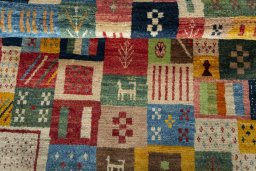 Full view of 2000s Persian Gabbeh rug from Iran / Persia, 135 × 96 cm in Multi Color tones
