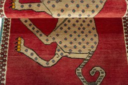 Full view of 2000s Persian Gabbeh rug from Iran / Persia, 156 × 97 cm in Red tones