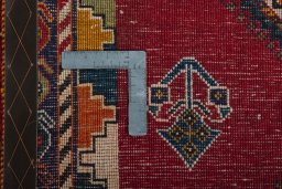 Close-up detail of 2000s Persian Gabbeh rug from Iran / Persia showing Wool weave
