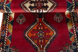 Full view of 2000s Persian Gabbeh rug from Iran / Persia, 196 × 91 cm in Red tones