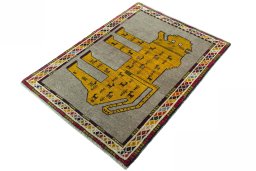 Corner detail of 2000s Persian Gabbeh rug showing border pattern and Wool pile
