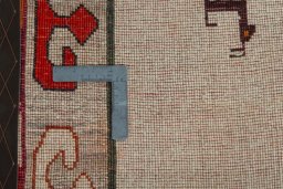 Close-up detail of 2000s Persian Gabbeh rug from Iran / Persia showing Wool weave