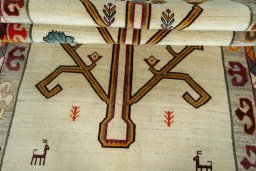 Full view of 2000s Persian Gabbeh rug from Iran / Persia, 257 × 142 cm in Beige tones