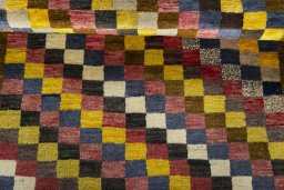 Full view of 2000s Persian Gabbeh rug from Iran / Persia, 145 × 107 cm in Multi Color tones