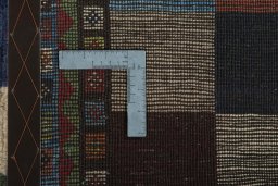 Close-up detail of 2000s Persian Gabbeh rug from Iran / Persia showing Wool weave