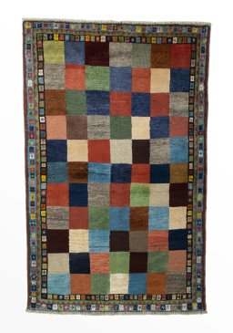 Full view of 2000s Persian Gabbeh rug from Iran / Persia, 161 × 103 cm in Multi Color tones