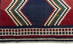 Central medallion detail of 2000s Persian Gabbeh rug from Iran / Persia