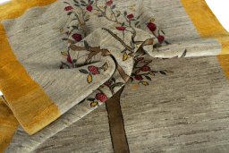 Corner detail of New Persian Gabbeh rug showing border pattern and Wool pile