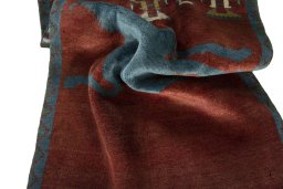 Corner detail of 2000s Persian Gabbeh rug showing border pattern and Wool pile