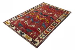 Corner detail of 2000s Persian Gabbeh rug showing border pattern and Wool pile