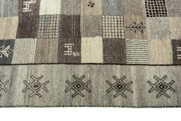 Close-up detail of 2000s Persian Gabbeh rug from Iran / Persia showing Wool weave