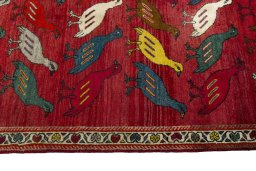 Close-up detail of 2000s Persian Gabbeh rug from Iran / Persia showing Wool weave
