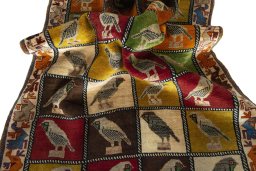 Corner detail of 1970s Persian Gabbeh rug showing border pattern and Wool pile