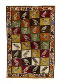Full view of 1970s Persian Gabbeh rug from Iran / Persia, 187 × 128 cm in Multi Color tones