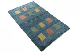 Close-up detail of 2000s Persian Gabbeh rug from Iran / Persia showing Wool weave