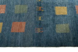 Close-up detail of 2000s Persian Gabbeh rug from Iran / Persia showing Wool weave