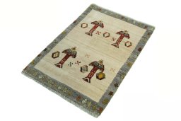 Corner detail of 2000s Persian Gabbeh rug showing border pattern and Wool pile