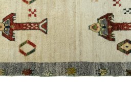 Close-up detail of 2000s Persian Gabbeh rug from Iran / Persia showing Wool weave