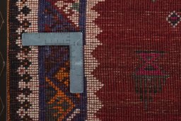 Surface texture of 2000s Persian Gabbeh rug with natural Wool and intricate pattern