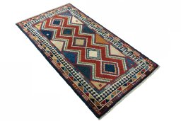 Close-up detail of 2000s Persian Gabbeh rug from Iran / Persia showing Wool weave