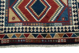 Central medallion detail of 2000s Persian Gabbeh rug from Iran / Persia