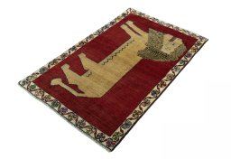 Corner detail of 2000s Persian Gabbeh rug showing border pattern and Wool pile