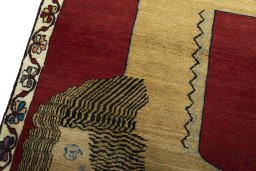 Backside of handmade 2000s Persian Gabbeh rug showing knot structure and weave density