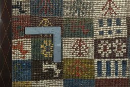 Close-up detail of 2000s Persian Gabbeh rug from Iran / Persia showing Wool weave