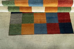Central medallion detail of 2000s Persian Gabbeh rug from Iran / Persia