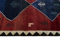 Close-up detail of 2000s Persian Gabbeh rug from Iran / Persia showing Wool weave