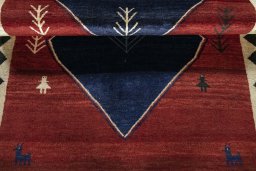 Full view of 2000s Persian Gabbeh rug from Iran / Persia, 200 × 112 cm in Red tones