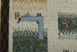 Close-up detail of 2000s Persian Gabbeh rug from Iran / Persia showing Wool weave