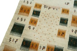 Backside of handmade 2000s Persian Gabbeh rug showing knot structure and weave density